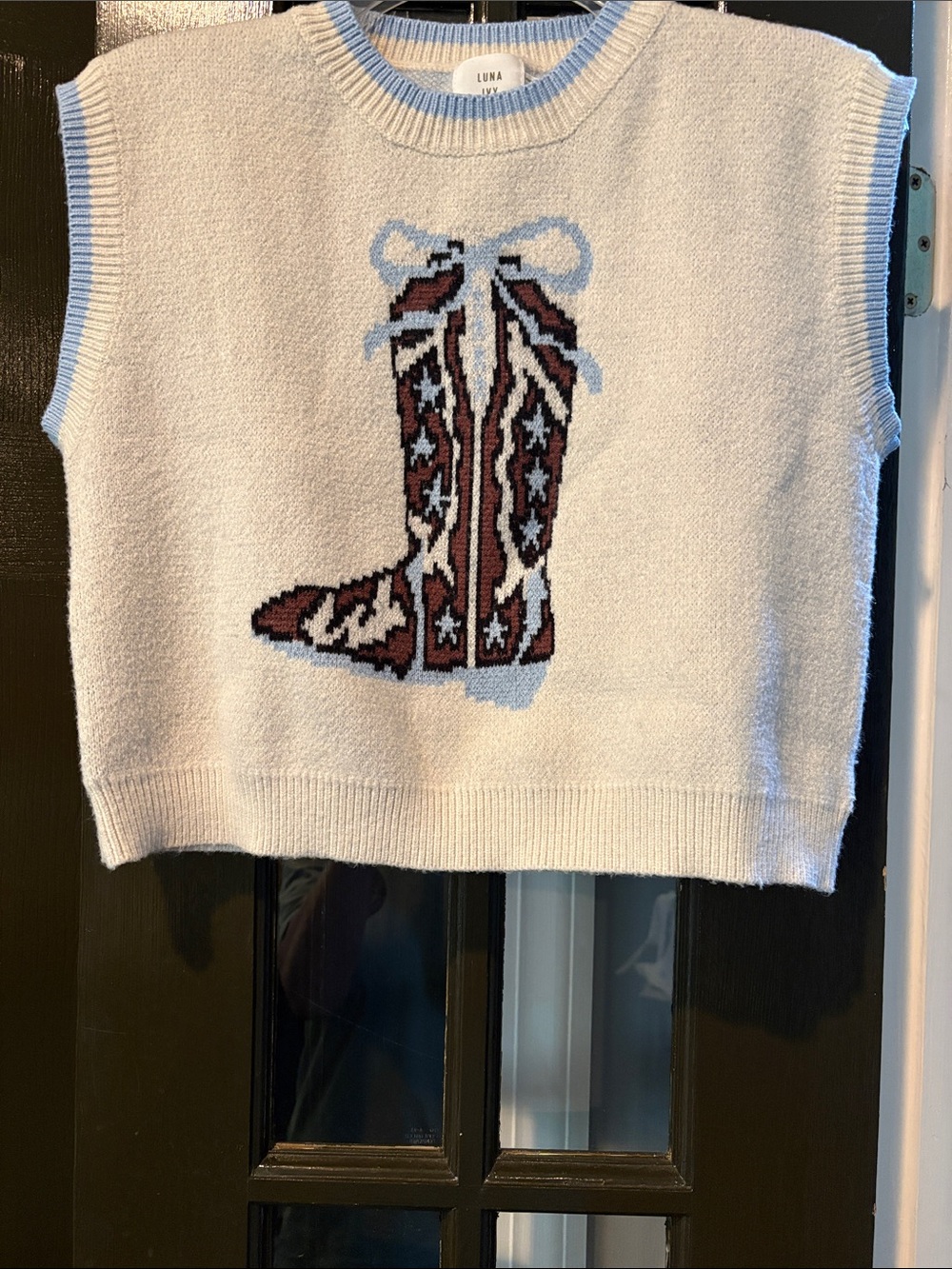 Luna Ivy Cream Knit Vest with Blue-Trim and Brown Cowboy Boot Motif